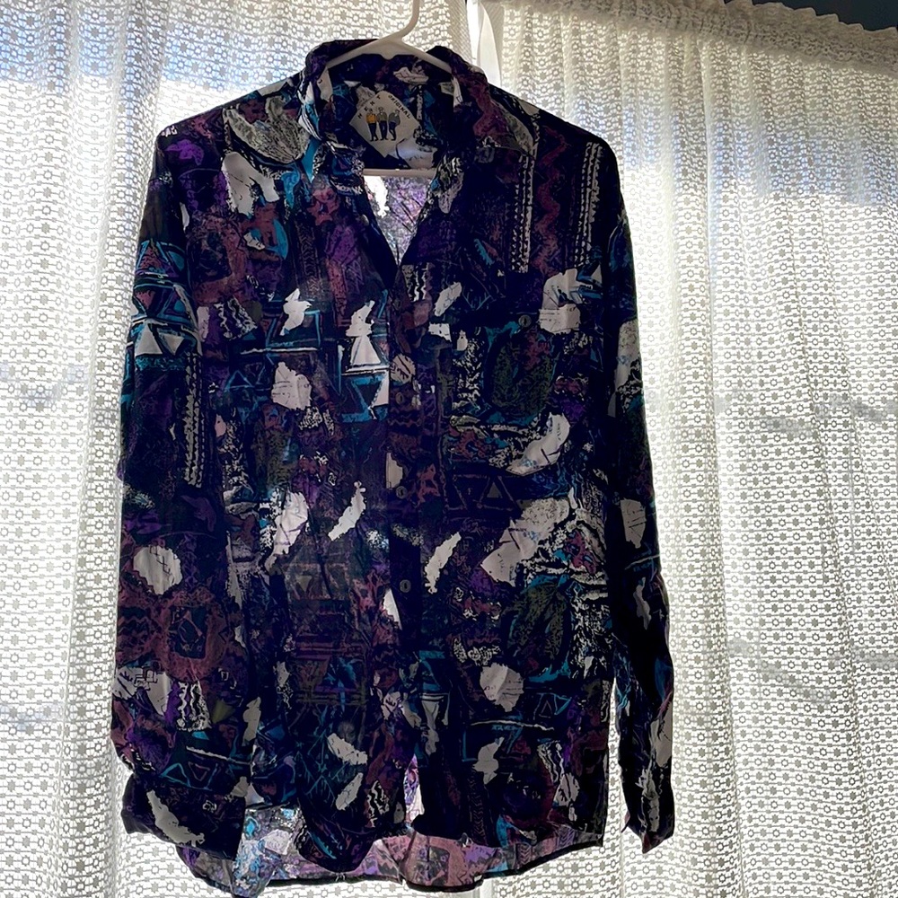 Color combination of violet, black, white, dead pink and ocean blue.